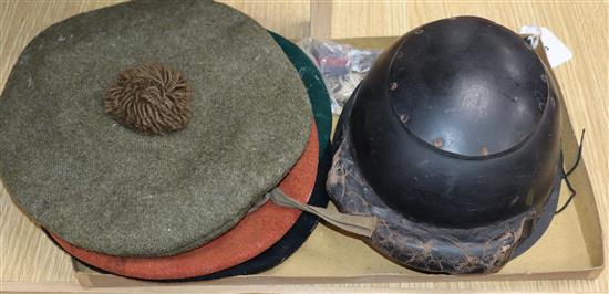 World War I leather helmet, a World War II tank regiment beret, two other berets, VAD badge, 1915 enamelled badge etc